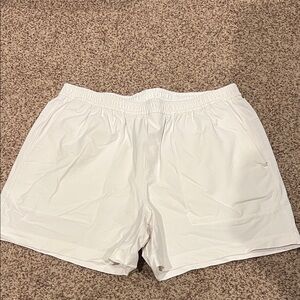Lululemon cream colored dress shorts